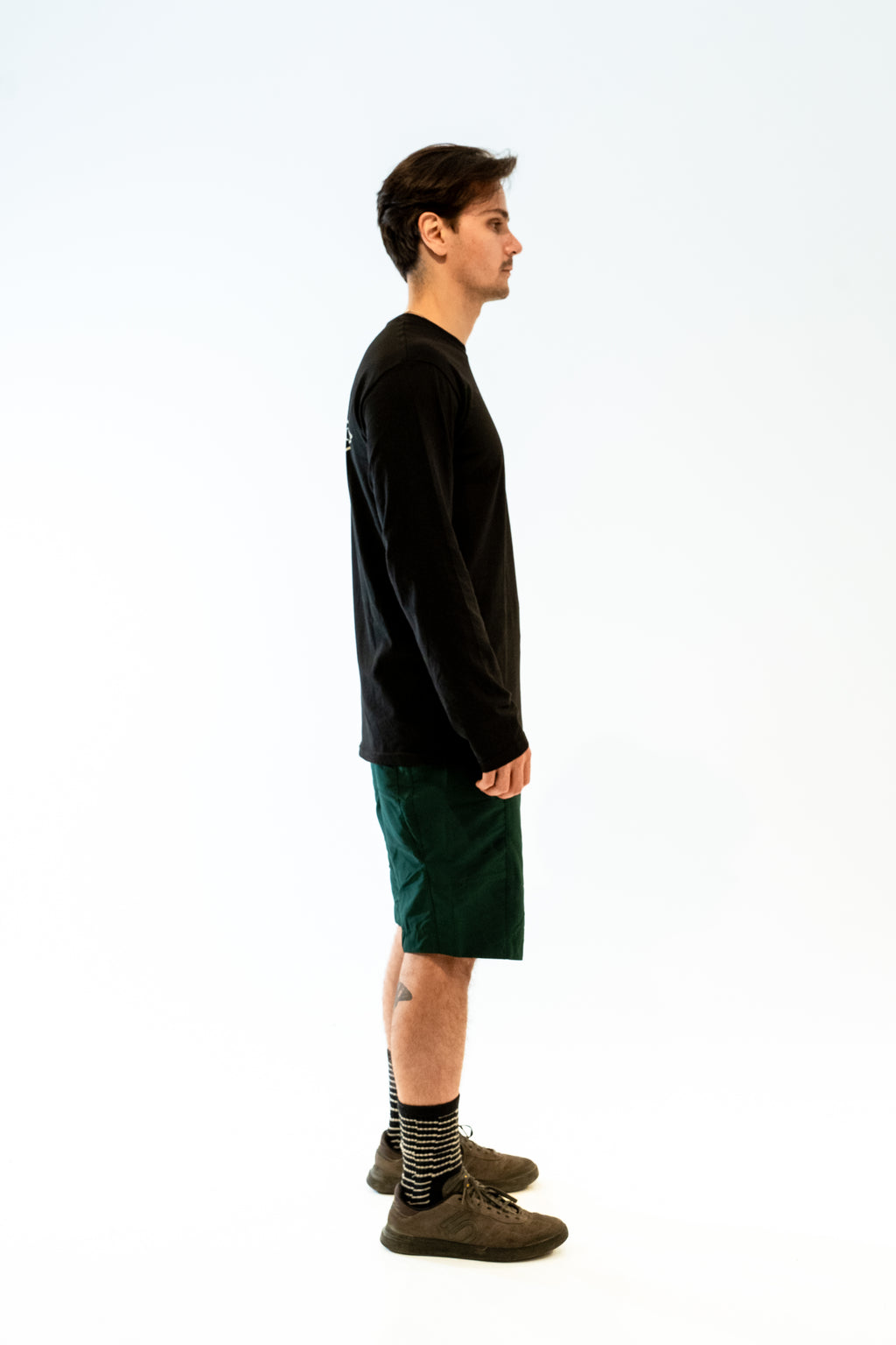 Bruma Trail Running Tee Negro - espalda fondo blanco