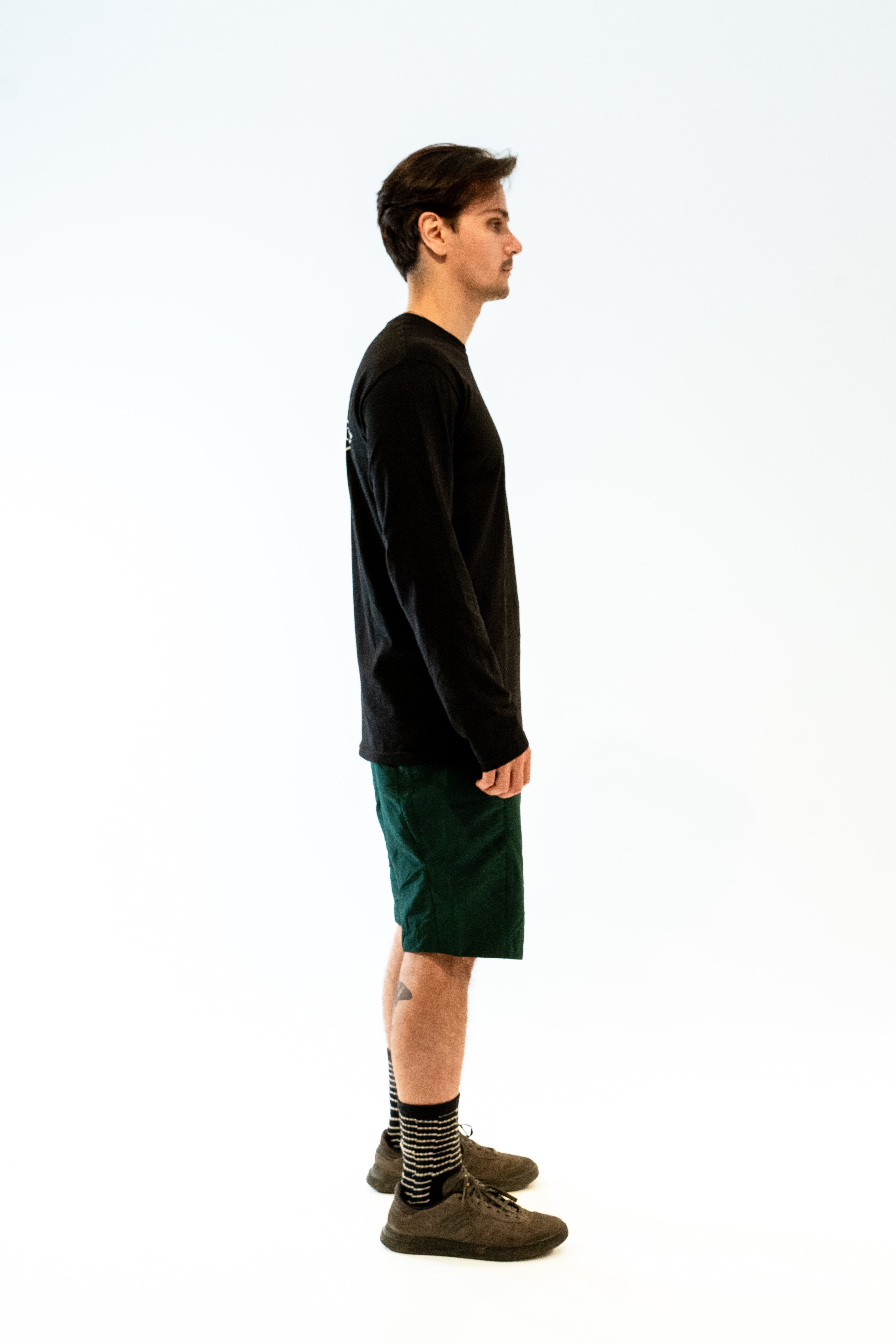 Bruma Trail Running Tee Negro - espalda fondo blanco